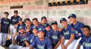 Al centro della foto, in alto, Filippo Gabriele nel doug-out del Chianti Baseball